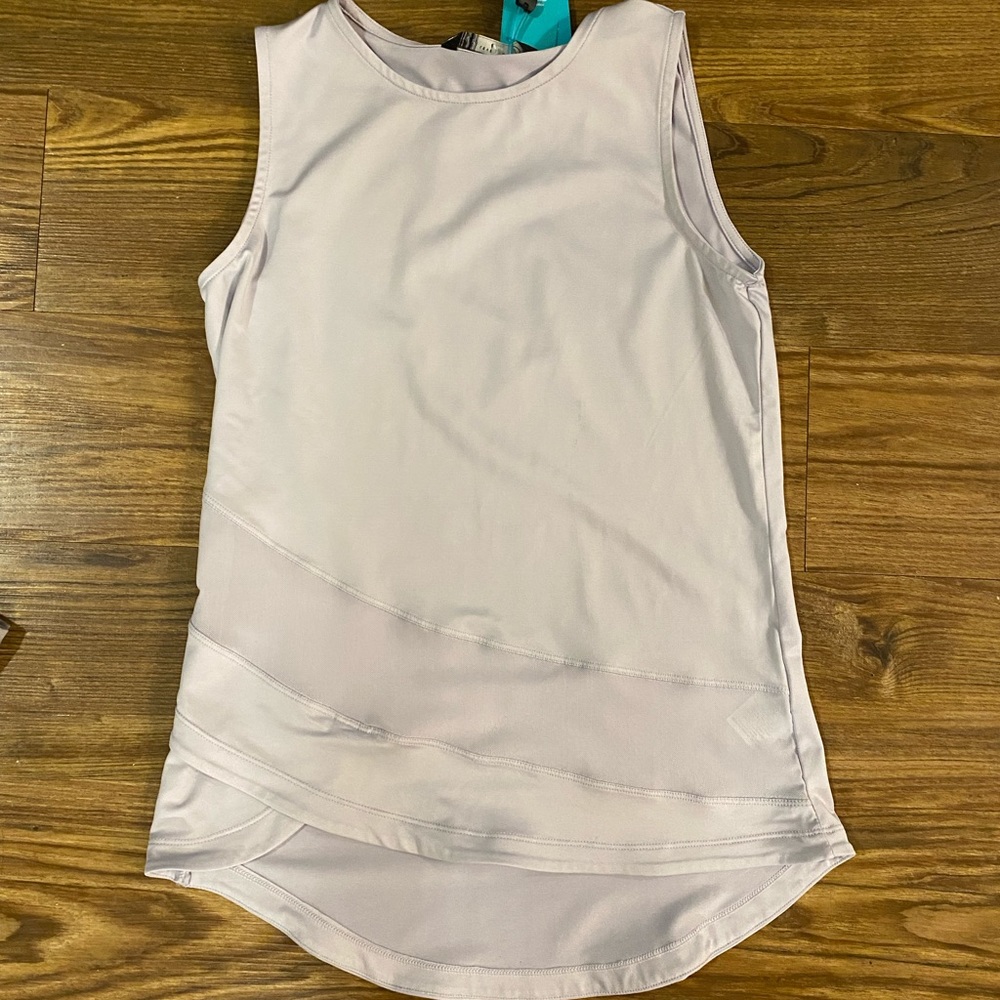 Lilac Levelwear workout top with cute detail around waist!
